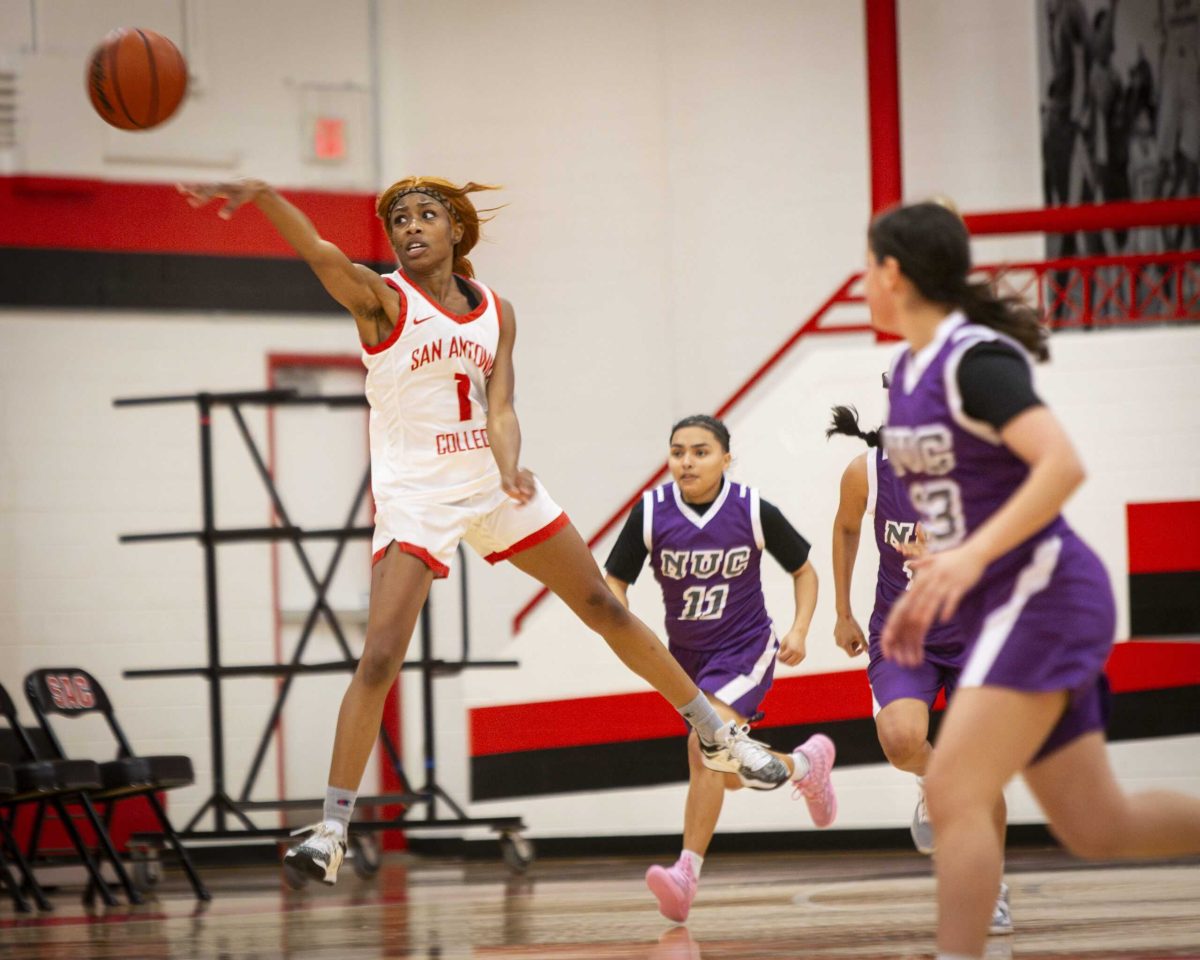 Small Forward Lakayla Hines launches the ball during the Armadillos’ game against Northwest Vista at SAC’s Candler Physical Education Center Feb. 14. Photo by A. De Leon.