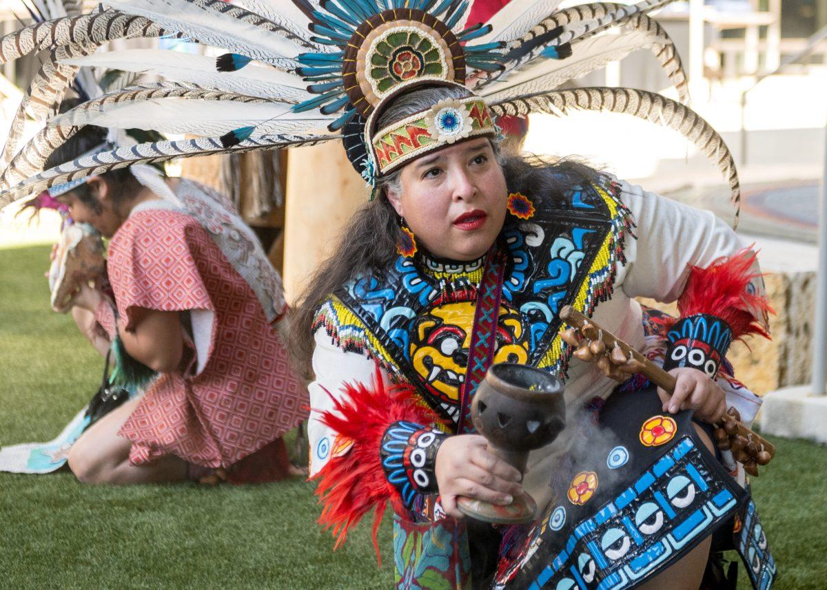 Karla Aguilar leads a ceremonial danza with other members of the Tāp Pīlam Coahuiltecan Nation during the Indigenous Peoples Heritage Month Ceremony at Alamo Colleges District ACCESS Building Nov. 21. Photo by A. De Leon.