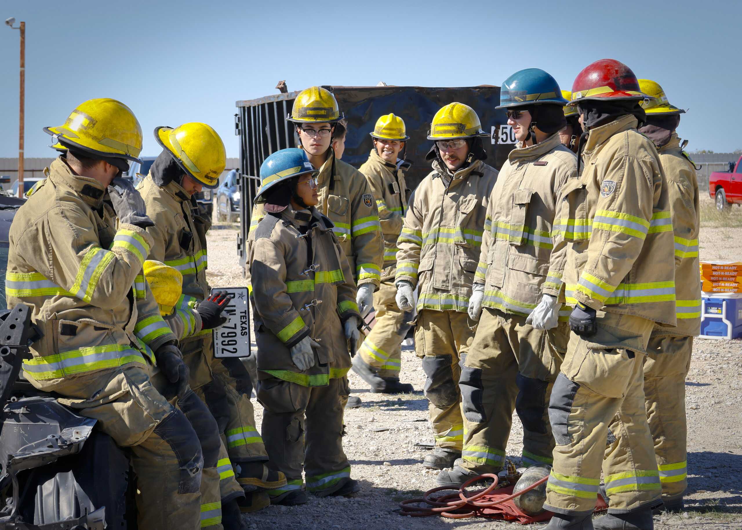 SAC Fire Academy cadets wait to begin a training session on vehicle extraction. Photo by Natalia Edwards.