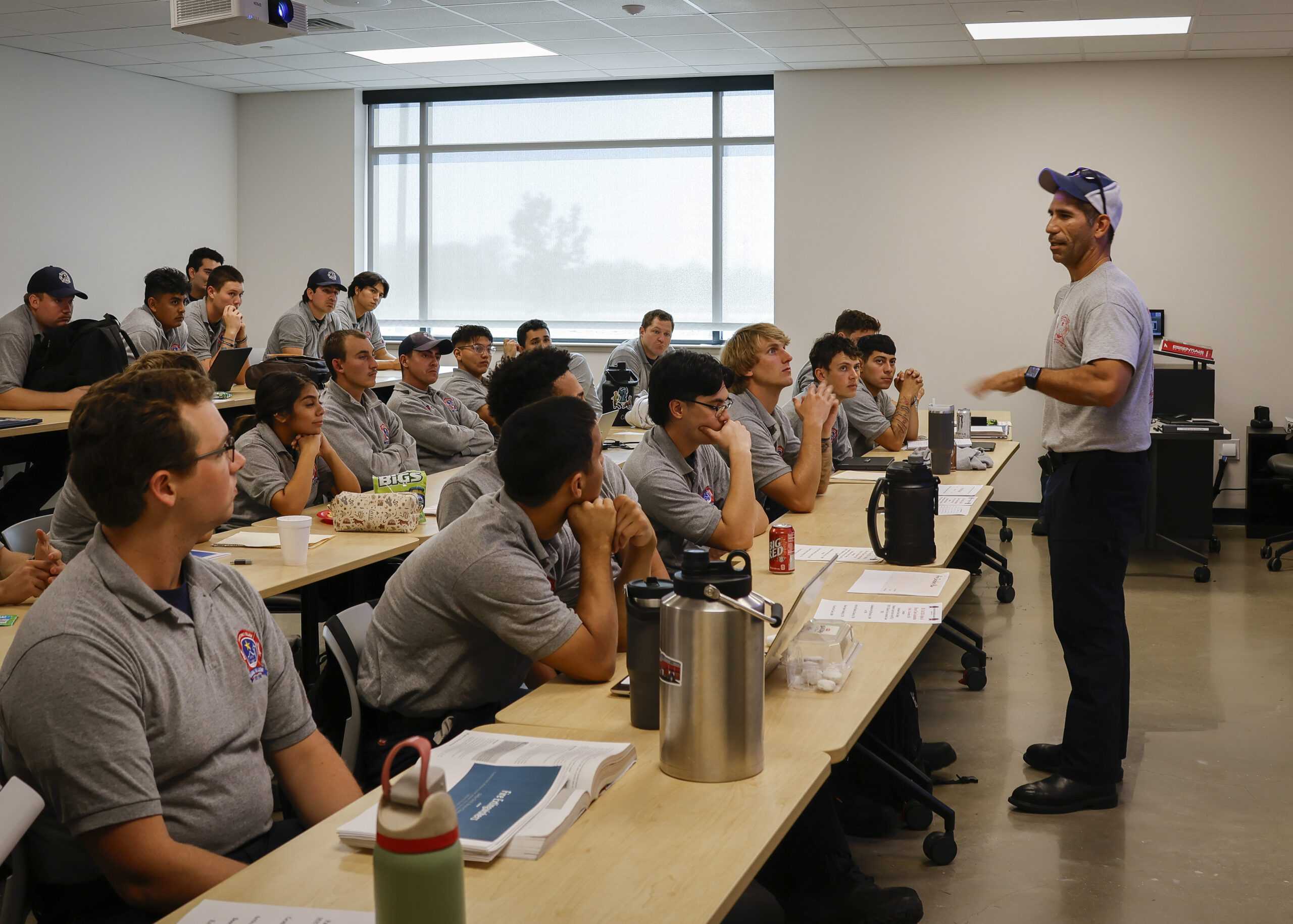 Captain Joe Hernandez, an instructor at SAC’s Fire Academy prepares cadets for their state exams Nov. 25. Photo by Natalia Edwards.