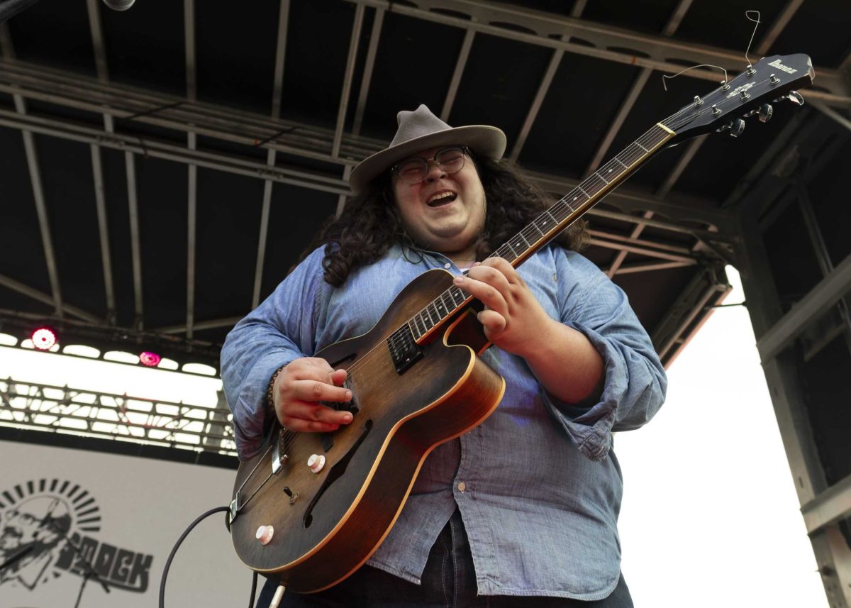 Arik Norris, lead guitarist for The Wizard, performs during the Fredstock music festival in Lot 13 May 1. Photo by Jacob R. Lopez.