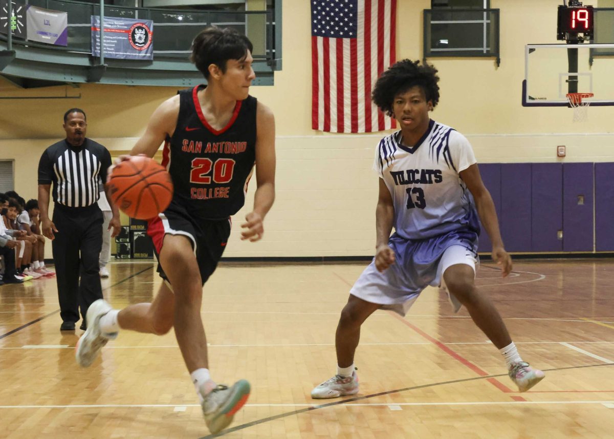SAC Forward Jovan Jimenez drives past a Wildcats defender at NVC's Huisache Hall Wednesday. Photo by Chris Hernandez.