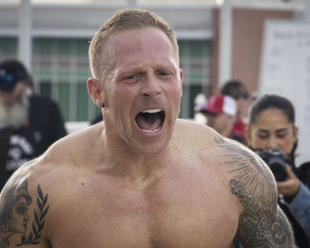 Philosophy Professor Dan Herrick cries out at the Backyard Beast finish line Oct. 24 after his team broke the course record. Photo by Blake White.