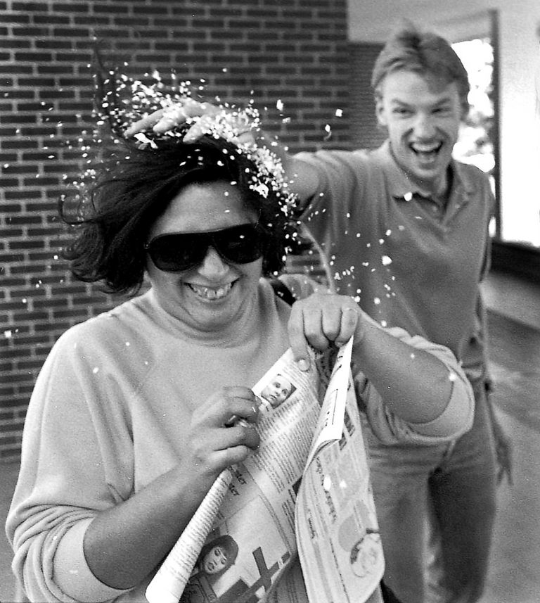 While working on the Ranger, Mark Magavern shows retired SAC Journalism Professor Irene Abrego the spirit of San Antonio during Fiesta. Archive photo.